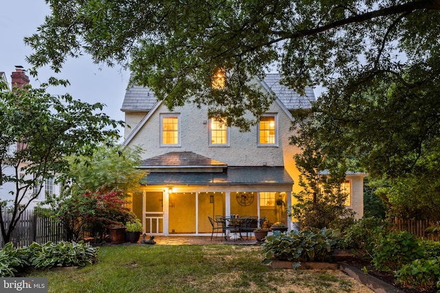 4404 Eastway, Baltimore, MD 21218 - back of house with a high end roof, a patio, and stucco siding