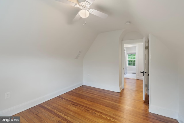 4404 Eastway, Baltimore, MD 21218 - additional living space with wood finished floors, lofted ceiling, a ceiling fan, and baseboards