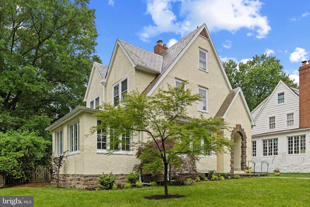 4404 Eastway, Baltimore, MD 21218 - view of property exterior featuring a lawn
