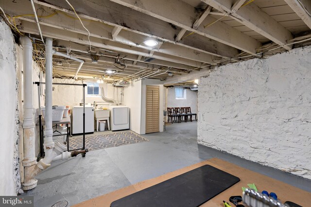 4404 Eastway, Baltimore, MD 21218 - below grade area featuring washer and dryer, a sink, and plenty of natural light