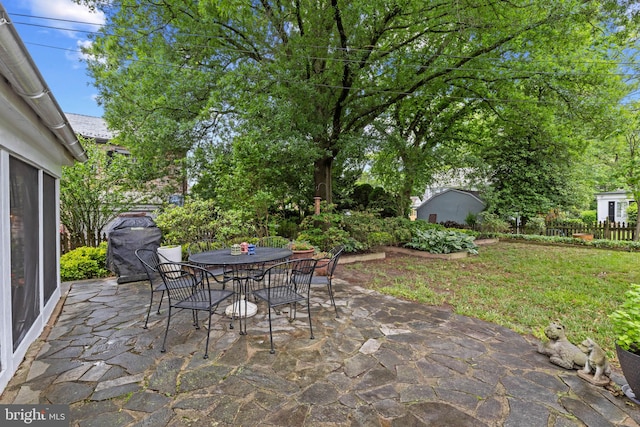 4404 Eastway, Baltimore, MD 21218 - view of patio with outdoor dining area and area for grilling