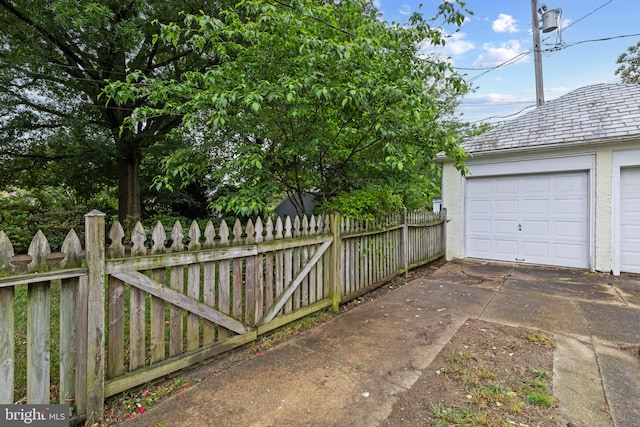 4404 Eastway, Baltimore, MD 21218 - garage featuring concrete driveway