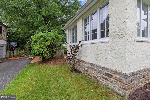4404 Eastway, Baltimore, MD 21218 - view of side of home featuring stucco siding