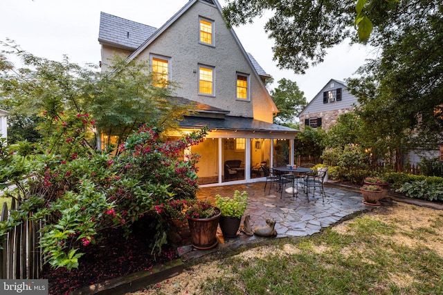 4404 Eastway, Baltimore, MD 21218 - back of house featuring a patio and stucco siding