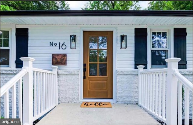 16 Stokes, Haddon Township, NJ 08108 - property entrance with brick siding and a porch