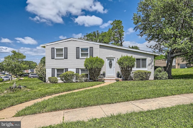 1201 Cobb Rd, Baltimore, MD 21208 - split level home with a front yard and entry steps