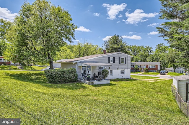 1201 Cobb Rd, Baltimore, MD 21208 - rear view of house with a lawn, a patio, and a chimney