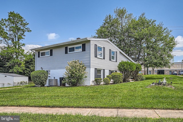 1201 Cobb Rd, Baltimore, MD 21208 - view of property exterior with a lawn and central air condition unit