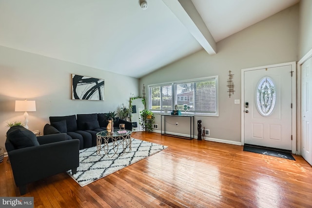 1201 Cobb Rd, Baltimore, MD 21208 - living room with wood-type flooring, beam ceiling, baseboards, and high vaulted ceiling