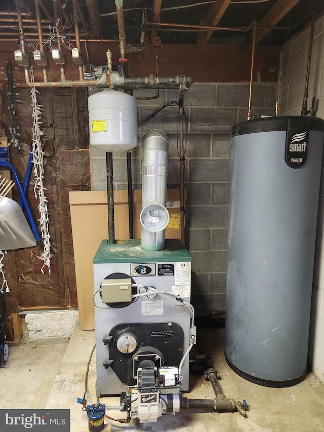utility room with water heater and a heating unit