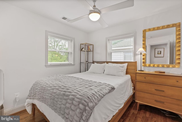 16 E Monroe Ave, Alexandria, VA 22301 - bedroom featuring dark wood-type flooring, baseboards, and a ceiling fan