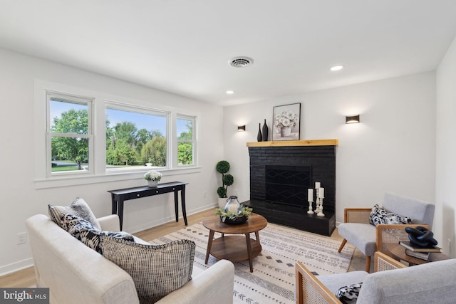 214 Dillard Ct, Front Royal, VA 22630 - living room with light wood-style floors, a fireplace, baseboards, and recessed lighting