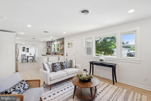 214 Dillard Ct, Front Royal, VA 22630 - living room featuring recessed lighting, light wood-style floors, and baseboards