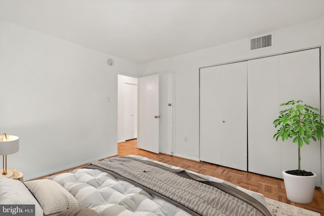 700 7th St SW Unit 507, Washington, DC 20024 - bedroom featuring a closet and baseboards