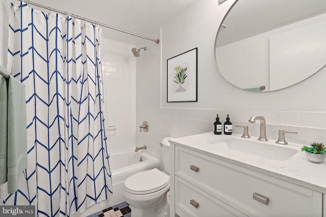700 7th St SW Unit 507, Washington, DC 20024 - bathroom featuring tile walls, toilet, shower / bath combo, and vanity