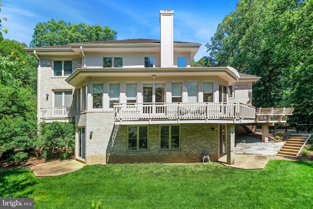 7005 Natelli Woods Ln, Bethesda, MD 20817 - back of house featuring brick siding, stairs, a lawn, a chimney, and a deck