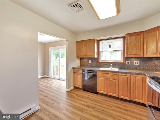 719 Loblolly Ln, Reading, PA 19607 - kitchen featuring dishwashing machine, range, a sink, and dark countertops