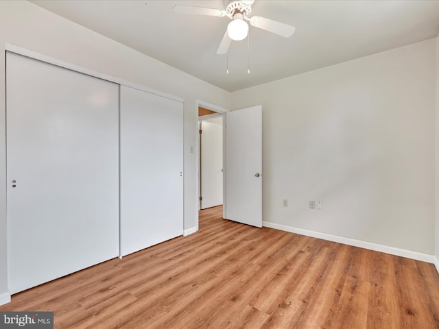 719 Loblolly Ln, Reading, PA 19607 - unfurnished bedroom with baseboards, light wood finished floors, a closet, and ceiling fan