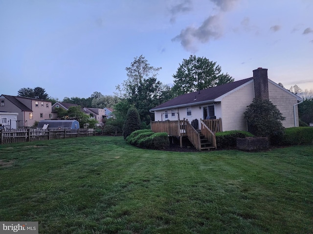 719 Loblolly Ln, Reading, PA 19607 - rear view of property with a chimney and a wooden deck