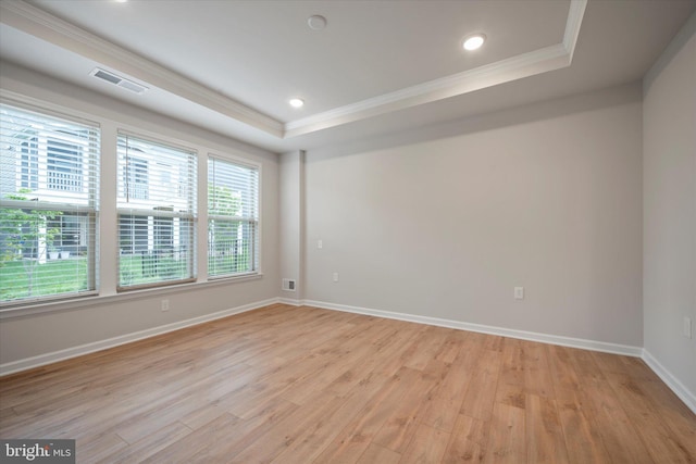 15741 Gardenia Ridge Way, Haymarket, VA 20169 - empty room featuring crown molding, a tray ceiling, light wood-type flooring, baseboards, and recessed lighting