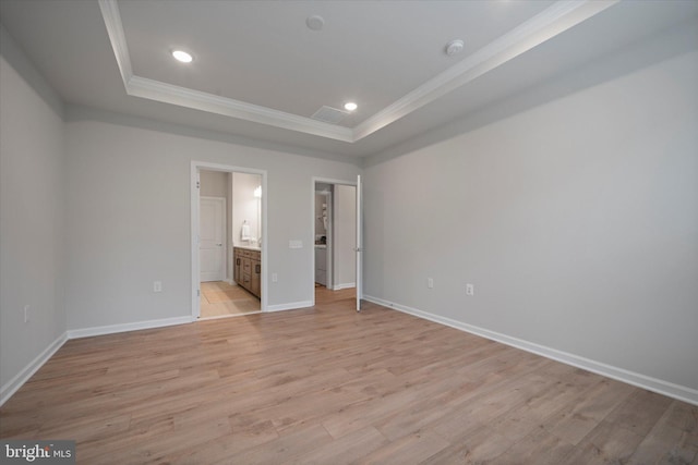 15741 Gardenia Ridge Way, Haymarket, VA 20169 - unfurnished bedroom featuring ornamental molding, a raised ceiling, light wood finished floors, baseboards, and recessed lighting