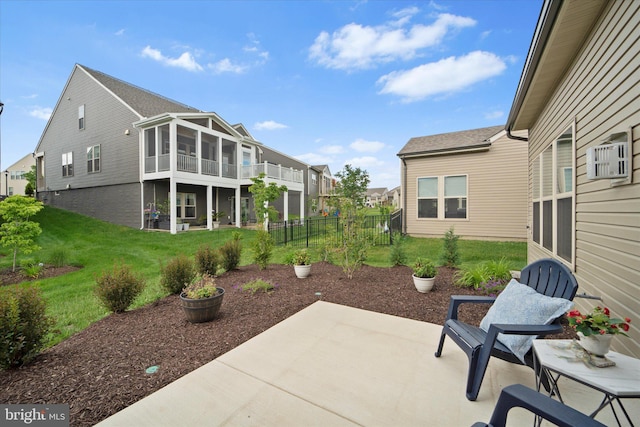 15741 Gardenia Ridge Way, Haymarket, VA 20169 - view of patio with a residential view and a sunroom