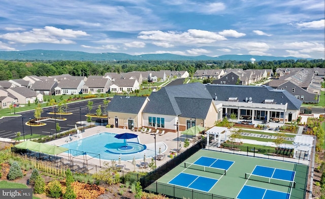15741 Gardenia Ridge Way, Haymarket, VA 20169 - community pool featuring a residential view, a mountain view, and a tennis court