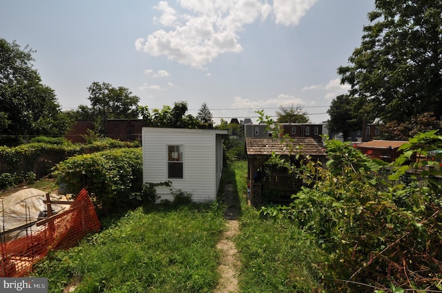 1249 Morse St NE, Washington, DC 20002 - view of yard featuring an outdoor structure and a storage unit