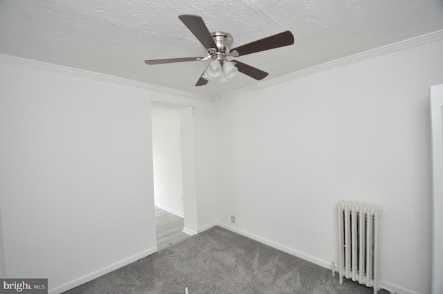 1249 Morse St NE, Washington, DC 20002 - unfurnished room featuring radiator, ceiling fan, ornamental molding, carpet floors, and baseboards