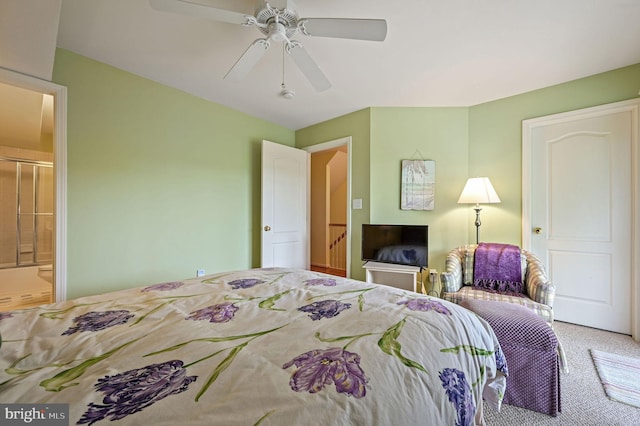 19830 Church St Unit 26, Rehoboth Beach, DE 19971 - carpeted bedroom featuring ensuite bathroom and a ceiling fan