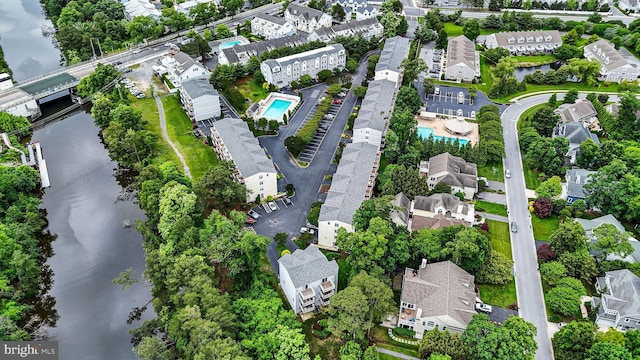 19830 Church St Unit 26, Rehoboth Beach, DE 19971 - view of property location featuring a large body of water, a pool, and nearby suburban area