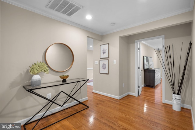 3949 Taney Ave, Alexandria, VA 22304 - hallway featuring light wood-style floors, ornamental molding, baseboards, and recessed lighting