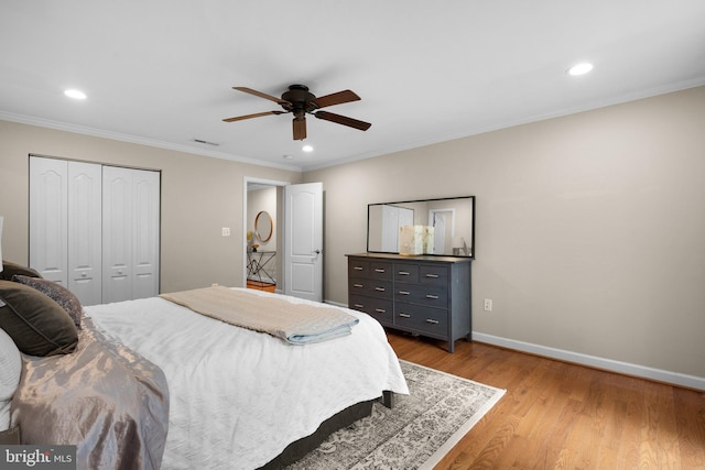 3949 Taney Ave, Alexandria, VA 22304 - bedroom with light wood-type flooring, a closet, recessed lighting, ornamental molding, and baseboards