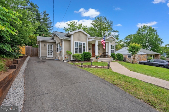 3949 Taney Ave, Alexandria, VA 22304 - view of front of house with covered porch, driveway, and cooling unit