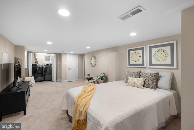 3949 Taney Ave, Alexandria, VA 22304 - bedroom featuring washing machine and clothes dryer, light colored carpet, recessed lighting, and baseboards