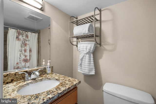 3949 Taney Ave, Alexandria, VA 22304 - full bathroom with vanity, toilet, and curtained shower