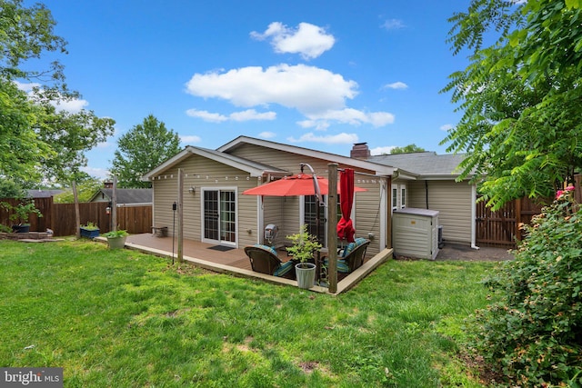 3949 Taney Ave, Alexandria, VA 22304 - rear view of house with a wooden deck and a chimney
