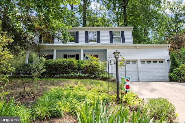 5455 Crowflock Ct, Columbia, MD 21045 - traditional home featuring concrete driveway and a garage