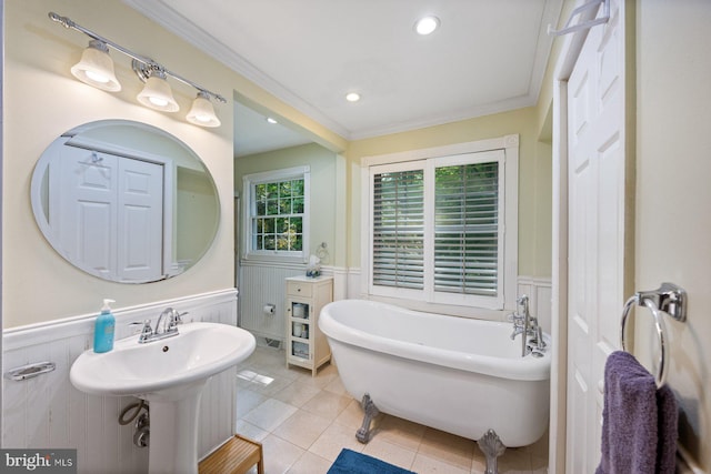 5455 Crowflock Ct, Columbia, MD 21045 - bathroom featuring wainscoting, a freestanding tub, ornamental molding, tile patterned floors, and recessed lighting
