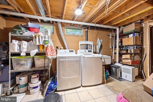 5455 Crowflock Ct, Columbia, MD 21045 - washroom featuring washing machine and clothes dryer and tile patterned flooring