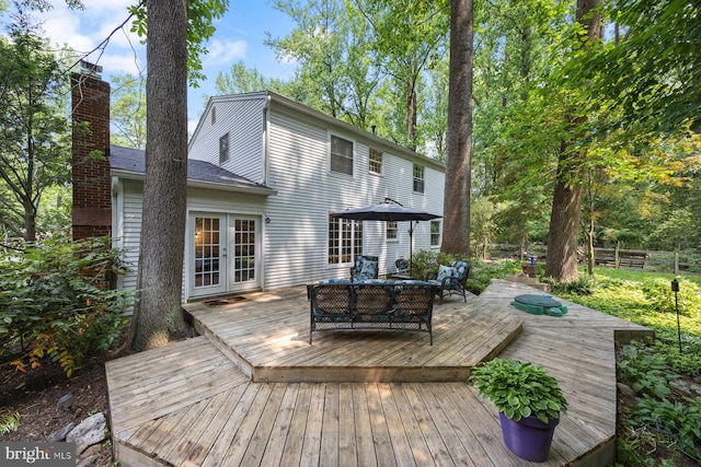 5455 Crowflock Ct, Columbia, MD 21045 - wooden deck with french doors and outdoor dining space
