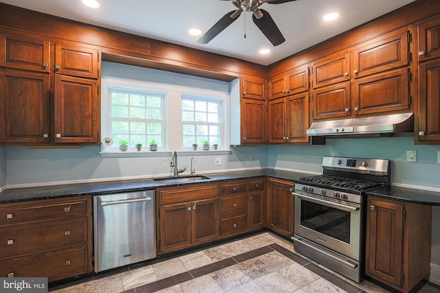 kitchen featuring appliances with stainless steel finishes, under cabinet range hood, a sink, a ceiling fan, and recessed lighting