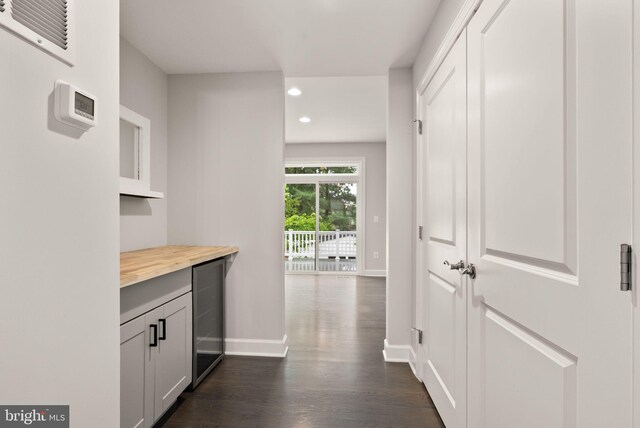 7101 27th Rd N, Arlington, VA 22213 - hall featuring baseboards, recessed lighting, dark wood-style floors, and beverage cooler