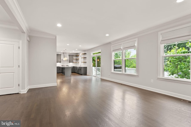 7101 27th Rd N, Arlington, VA 22213 - unfurnished living room featuring ornamental molding, baseboards, recessed lighting, and dark wood-style flooring