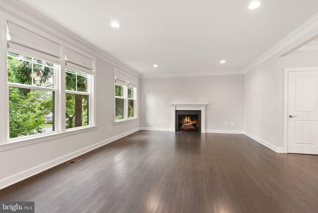 7101 27th Rd N, Arlington, VA 22213 - unfurnished living room featuring dark wood-type flooring, ornamental molding, recessed lighting, baseboards, and a lit fireplace