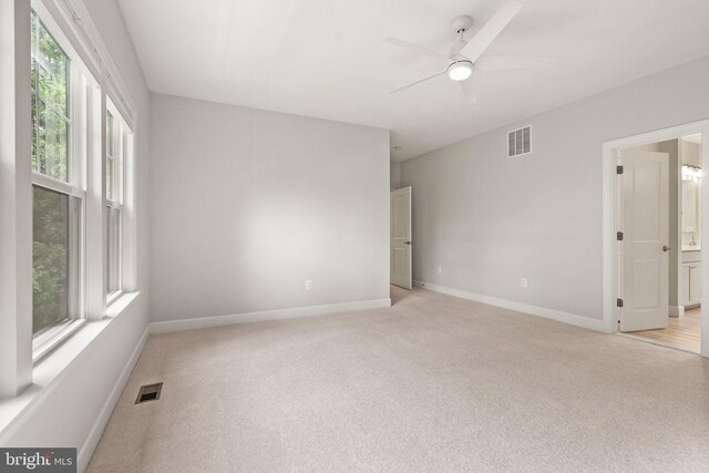 7101 27th Rd N, Arlington, VA 22213 - spare room with light carpet, baseboards, and a ceiling fan
