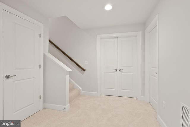7101 27th Rd N, Arlington, VA 22213 - hallway with carpet floors, baseboards, stairway, and recessed lighting