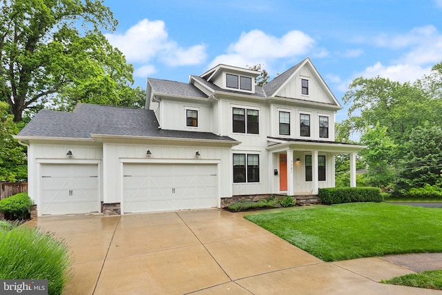 7101 27th Rd N, Arlington, VA 22213 - modern farmhouse style home featuring board and batten siding, concrete driveway, a front yard, an attached garage, and roof with shingles
