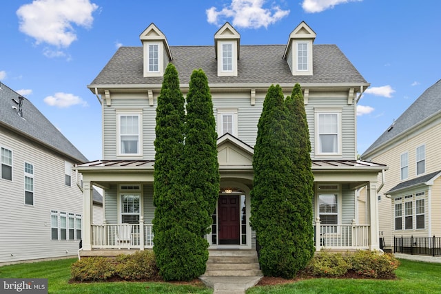25146 Mineral Springs Cir, Aldie, VA 20105 - view of front of home featuring covered porch, a shingled roof, a standing seam roof, and metal roof