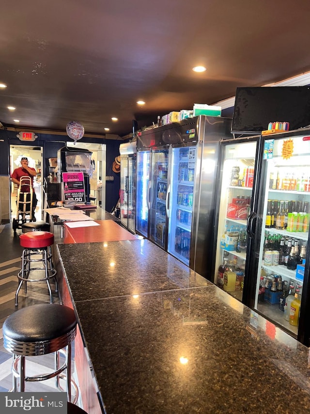 bar area with recessed lighting
